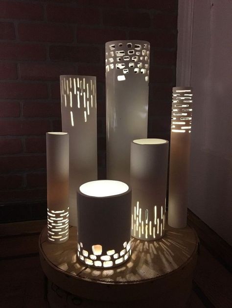 Turn PVC Pipes into Luminaries What if you put a plant in the top of one of these. Would have to be a pot in a pot in order to take it out and water. Interesting Pvc Pipe Fittings, Craft Supply Storage, Canvas Drop Cloths, Pvc Pipe Projects, Lampe Diy, Pvc Projects, Pipe Lighting, Pvc Pipe, Modern Lamp