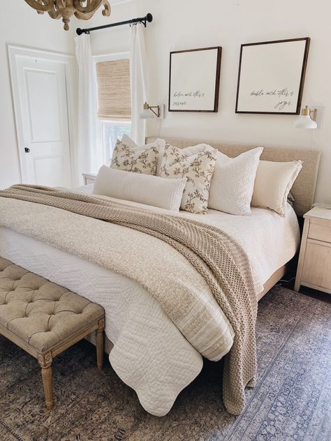 Beige Bedroom Ideas Aesthetic, Beige Layered Bedding, Master Bedrooms Neutral Colors, Queen Bed Decor Ideas, Master Bedrooms Decor Farmhouse Boho, Decorating Vaulted Ceiling Walls, Bed Between 2 Windows, Between Windows Decor, Light And Airy Bedroom Ideas