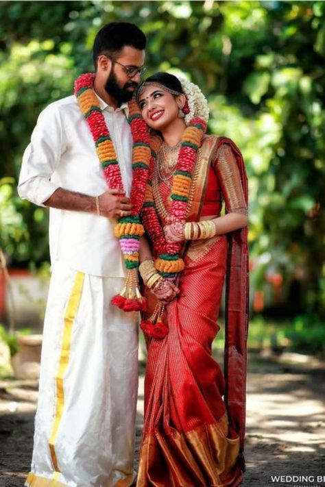 Here are Some BEST Couple Photography Ideas & Poses for South Indian Couples that you MUST need to capture for your wedding functions. #weddingbazaar#indianwedding #coupleweddingphotography #coupleweddingphotographyindian #coupleweddingphotographyposes #coupleweddingphotographyforeheadkisspicture #coupleweddingphotographyromantic #coupleweddingphotographyphotoposes #southindianweddingphotography #southindiancouplephotoshoot #southindiancouplephotoshoottraditional #southindiancouplephotoshootpose Indian Wedding Couples, Hindu Wedding Photos, Photography Ideas Poses, Kerala Brides, Marriage Photoshoot, Marriage Poses, Marriage Stills, South Wedding, Bride Photos Poses