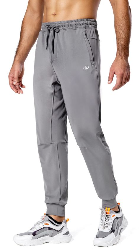 PRICES MAY VARY. 87% Polyester, 13% Spandex Imported Zipper closure Adjustable Elastic Waist: Elastic waistband with adjustable drawstring for a custom fit. Side deep pockets and back pocket are all designed with zipper to ensure put phone, cards safe when moving. Soft and stretchy material keeps you comfortable, offers a smooth, low-friction performance. Tapered trouser legs and stretchy ankle cuffs keep length suitable for doing exercise. These jogger sweatpants are perfect for running, joggin Mens Track Pants, Jogging Workout, Buff Guys, Mens Running Pants, Men Joggers, Mens Joggers Sweatpants, Athletic Tops Women, Mens Workout Pants, Gym Wear Men
