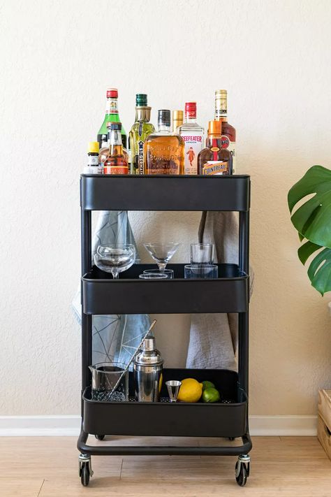 How to Stock a Home Bar: Liquor, Liqueurs, Bitters, and Wine Wine Bar Small Apartment, Mini Bar Cart Ideas Small Spaces, Cocktail Trolley Ideas, Liquor Corner Ideas, Small Alcohol Bar For Home, Liquor Table Ideas, Bar Area In Bedroom, Diy Minibar Ideas, Wine Cart Ideas Small Spaces