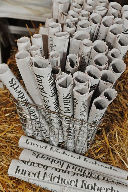 Details by JonesRobertsWedding - Newspaper Programs. I created the file in InDesign and sent it to schoolpaperexpres.... It was unique and pretty inexpensive Newspaper Seating Chart, Newspaper Table Decor, Newspaper Centerpiece Ideas, Newspaper Party Theme, Wedding Newspaper Display, Newspaper Theme Party, Newspaper Decor, Avengers Wedding, Newspaper Wedding Invitations