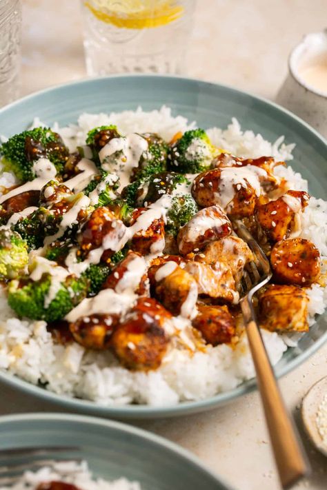 Fill up on satisfying protein and flavor with these Sticky Chicken Rice Bowls. Between the bowl base, the delicious sticky sauce, and the spicy mayo drizzle, you can expect this to become your new favorite meal. Essen, Pork Rice Bowl Recipe, Homemade Soy Sauce, Pork Rice Bowl, Rice Bowl Recipe, Sticky Sauce, Chicken Breast Crockpot Recipes, Sticky Pork, Crockpot Chicken Breast