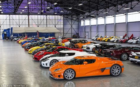 Out of the rain: One supercar fan dressed as Top Gear's The Stig stands in the middle of the fleet as they are lined up inside a hanger Luxury Car Garage, Luxury Cars Rolls Royce, Luxury Garage, Dream Car Garage, Luxury Sports Cars, High Performance Cars, Car Museum, Ferrari F40, Car Showroom