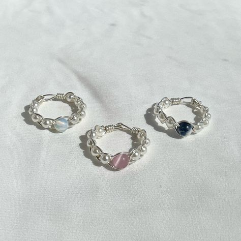 These Braided Gemstone and Pearl Rings are now available in silver! 🎀 • • • #wirewrappedjewelry #wirewrappedring #wirewrapping #wirewrappedcrystals #etsyseller #etsysellersofinstagram #etsyhandmade #etsyhandmadejewelry #shopsmall #etsyjewelry Pearl Ring Silver, Silver Wire Rings, Etsy Jewelry Handmade, Silver Wrap Ring, Pearl Rings, Ring Wire, Ring Crystal, Wire Wrapped Ring, Braided Ring