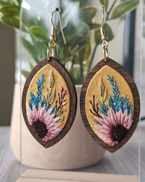 These beauties are complete! I'm so in love with how they turned out. The wooden pendants were made by @carrie_in_color and I couldn't believe how beautiful they were. I was actually afraid to put embroidery pieces into them because I didn't think I could do these wooden pieces justice. But after some thought and getting some inspiration, I was able to come up with a few pieces that I can't wait to show you all. I hope you love these 💙 . . . . . . . . . . #embroideryearrings #floralart... 2024 Crafts, Wooden Pendants, Wooden Pendant, So In Love, I Can't Wait, How Beautiful, Floral Art, I Hope You, Carry On