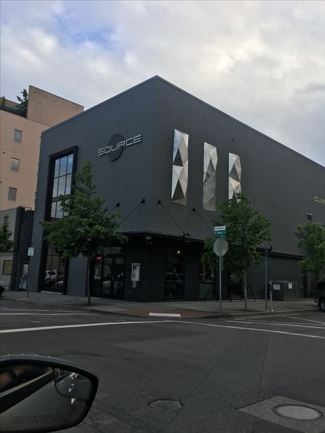 Source | Vancouver WA This is a rock climbing gym in downtown Vancouver. All black with high reflective accents gives this location a modern feel. What is most interesting about this location is that unless you can see in the windows, nothing about this exterior shows that it is an indoor rock climbing gym. I think this sense of "mystery" serves to make it a much more interesting location and design. I thought it was a night club the first time I saw it. Modern Gym Exterior, Gym Building Design Exterior, Gym Remodel, Gym Exterior, Gym Building, Rock Climbing Gym, Indoor Rock Climbing, Gym Interior, Climbing Gym