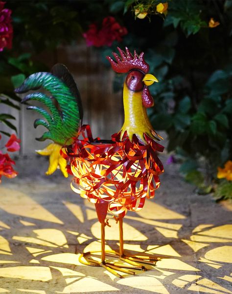 PRICES MAY VARY. 【Eye-catching Garden Decor】: This Goodeco outdoor statue is not only a stunning yard decor but also doubles as a functional lamp, giving your yard a warm and cozy ambiance at night with its solar-powered LED light. It's a perfect way to add some warmth and charm to your outdoor space. 【Stylish & High-quality Metal Design】: This 21.7 Inch Metal Solar Rooster Statue is made of high-quality metal material that is both stylish and Strong, ensuring that it can withstand harsh outdoor Rooster Statue, Statue Garden, Rooster Decor, Cozy Ambiance, Red Rooster, Outdoor Statues, Gifts Fo, Metal Material, Outdoor Indoor