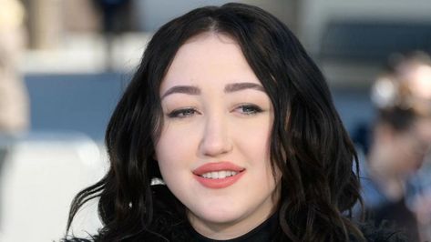 Have you ever wondered about the transformation of the young and talented Noah Cyrus-American singer? Noah’s journey is captivating, from growing up alongside her well-known sister, Miley Cyrus-American singer songwriter , to carving her identity as a singer-songwriter. This rising star has graced screens with her acting and garnered attention as a Grammy-nominated artist.  Noah ... Read more Instagram Comments, Noah Cyrus, Grammy Nominations, After Photos, Elle Fanning, Cosmetic Surgery, Her Music, Grammy Awards, Her Smile