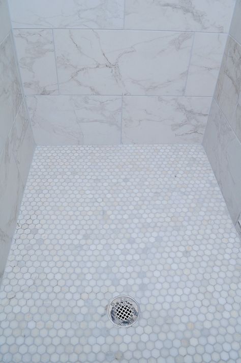 Marble Look Master Bath, Hex Tile Laundry Room Floor, Coastal Bathroom Tiles Ideas, Groutless Tile Shower Ideas, 12*24 Bathroom Tiles, Tile That Looks Like Marble, Marble Look Shower Walls, 12x24 Carrara Shower Wall Tile, Grout Colors For Marble Tile