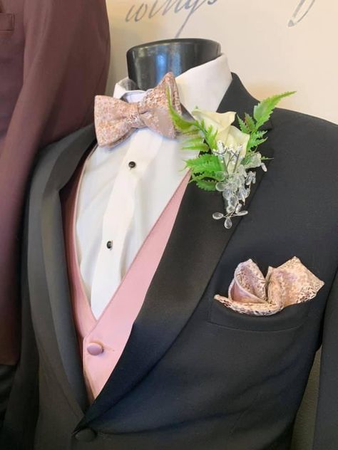 Stunning black tuxedo with pink accents! #ImAtEO #tuxedo #pink #blacktuxedo #black #elegantoccasions #sayyestothetux #wedding #groom #groomsmen #centralwisconsin Quince Suits For Guys Pink, Pink Quinceanera Suit, Pink Quince Suits, Chambelanes Outfits Quinceanera Pink And Black, Blush Pink Chambelanes, Pink Quinceñera Makeup, Cherry Blossom Quince Theme, Light Pink Tuxedo Prom, Wedding Dresses With Pink Accents