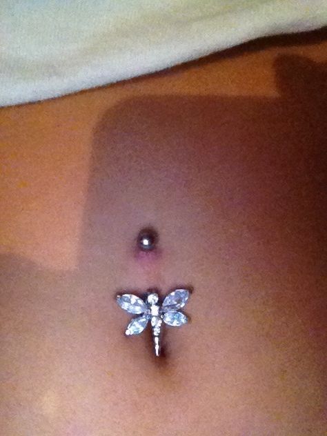My new belly button piercing! Dragonfly. Little red bc I was messin with it Persings Belly Button, Outer Belly Button Piercing, Belly Button Piercing Y2k Aesthetic, Belly Bars Pretty, Britney Spears Belly Button Piercing, Belly Button Piercing Hippy, Belly Button Piercing Placement, Belly Button Piercing Anatomy, Starter Belly Button Piercing