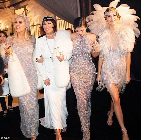 A look: Khloe here is pulling an awkward face as she walks with Kris, Kylie and Kendall Chiffon Headwrap, Great Gatsby Outfits, Gatsby Party Outfit, Gatsby Outfit, Look Gatsby, Gatsby Birthday, Gatsby Birthday Party, Gatsby Party Dress, Feather Wrap
