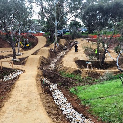 The team is hard at work surfacing the pump track and jumps at Shepherds Hill. It will need a few days to set so please no riding until we open the facility. Won't be long!  #trailscapes #pumptrack #shepherdshill Bike Pump Track, Dirt Bike Track, Backyard Skatepark, Jump Park, Trail Building, Motocross Tracks, Pump Track, Bmx Dirt, Mtb Trails