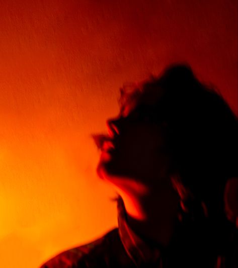 Orange Light Portrait, Red Aesthetic Portraits, Orange Light Photography, Orange Photography Aesthetic, Orange Light Photoshoot, Orange Lighting Photography, Orange Cyberpunk Aesthetic, Moody Lighting Photography, Warm Red Aesthetic