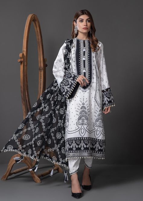 Include: Puff Paste Printed Chiffon Dupatta Digital Printed Dupatta Chatta Patti Paste Printed Front Panel Paste Printed Lawn Back + Sleeves Embroidered Daman Border Embroidered Sleeve Border Embroidered Neckline Cambric Cotton Trouser Fabric: Lawn Work technique: Embroidered Description: Anaya by Kiran Chaudhry presents with you Monochrome mystique Collection This is a 3 piece unstitched outfit Note: The color of the outfit may vary due to lighting effect use in photography White Salwar Kameez, Pakistani Winter Dresses, Pakistani Suits Online, Printed Dupatta, Suits For Sale, Chiffon Dupatta, Embroidered Neckline, Suit Fabric, Fabric Stores Online