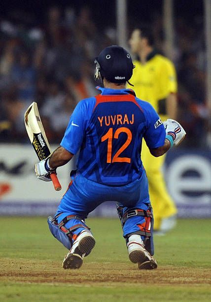 Indian batsman Yuvraj Singh celebrates after victory in the quarter-final match of The ICC Cricket World Cup 2011 between India and Australia at The Sardar Patel Stadium, Motera in Ahmedabad on March 24, 2011. India beat Australia by five wickets AFP PHOTO/Indranil MUKHERJEE Yuvraj Singh Hd Wallpaper World Cup, Yuvaraj Singh Wallpaper, Yuvraj Singh Hd Wallpaper, Cricket Books, Cricket Quotes, Ms Dhoni Wallpapers, Yuvraj Singh, India Cricket Team, World Cricket