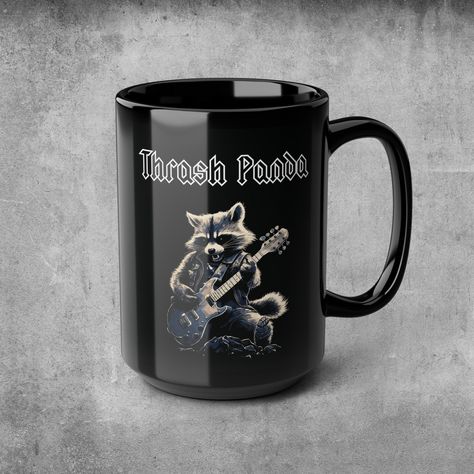 Thrash Panda Raccoon Mug, Thrash Metal Mug, Heavy Metal Mug, Funny Mug, Meme Mug, Black Coffee Mug, Black Tea Mug, Black Mug, 15oz ----- These black mugs come in one size - 15oz (0.44l) - plenty for morning caffeine boosts and hot cups of tea on a rainy day. They're easy to grip and feel sturdy thanks to the C-shaped handle. Add more personality by decorating them with your original designs. They'll be printed on the black ceramic material in picture-perfect quality with a glossy finish. .: Black ceramic material with a glossy finish .: One size: 15oz (0.44 l) .: C-shaped easy-grip handle .: Lead and BPA-free