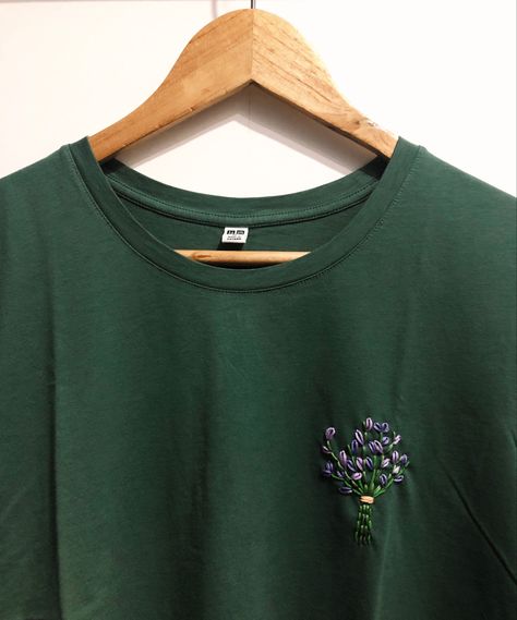 Embroidery DIY Couture, Embroidery On Green Shirt, Lavender Embroidery Shirt, Green Sweatshirt Embroidery, How To Embroider On Tshirts, Green Shirt Embroidery, Crewneck Embroidery Diy, Embroidery On Dark Green Fabric, Embroidery On Tee Shirts