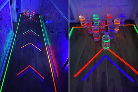 Mum turns her hallway into a glow-in-the-dark bowling alley using water bottles and Amazon bargains Glow In The Dark Bowling Diy, Diy Bowling Alley, Glow In The Dark Bowling, Neon Bowling, Steam Night, Glow Party Decorations, Diy Bowling, Cosmic Bowling, Project Graduation