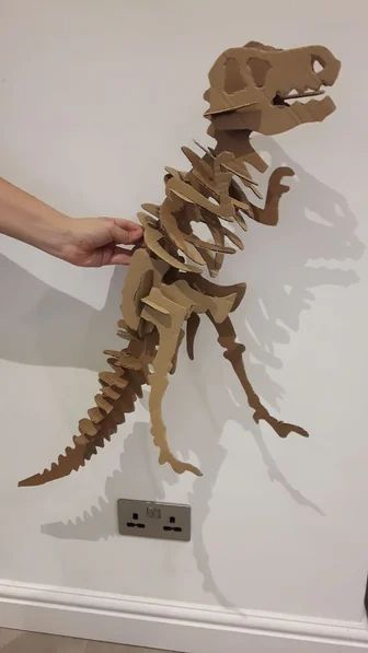 Large Cardboard Dinosaur Skeleton Dinosaur Skeleton Craft, Cardboard Animals Template, Cardboard Dinosaur, Dinosaur Decorations, Skeleton Craft, Paper Dinosaur, Cardboard Animals, Cardboard Puzzle, Dinosaur Balloons