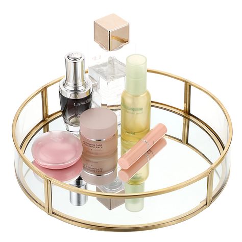 PRICES MAY VARY. Glass Mirrored Tray -This vanity tray featuring metal frame,thick glass materials and a mirror base. Sturdy quality and exquisite workmanship, the felt bottom is non-slip and will protect your furniture. Size(Lx Wx H): 9.9"x 9.9"x 2"(Please pay attention to the size before purchasing) Versatile Cosmetic Tray - Designed for display & storage, this round tray can serve as a perfume tray, makeup tray, jewelry tray, bathroom tray, decorative tray , desk organizer tray even serving t Gold Mirror Tray, Tray Mirror, Perfume Organizer, Desk Organizer Tray, Bathroom Vanity Tray, Makeup Tray, Mirror Jewelry, Mirror Vanity Tray, Dresser Tray