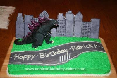 Homemade Godzilla Birthday Cake: My son is a huge Godzilla fan and nothing else would do for his birthday.  I didn't want to tackle making Godzilla from fondant or gum paste so I purchased Diy Godzilla Cake, Godzilla Cakes, Godzilla Birthday Cake, Diy Birthday Cakes, Godzilla Cake, Godzilla Party, Godzilla Birthday Party, Birthday Cake Inspiration, Homemade Birthday Cake