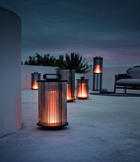 Gloster Ambient Lighting - AMBIENT LANTERN gloster outdoor light Gloster These moody lanterns from Gloster are made from mouth-blown smoked glass and cast metal. Lantern Table Lamp, Solar Light Crafts, Lawn Lights, Jw Marriott, Light Crafts, Outdoor Lawn, Glass Lantern, Solar Lights Garden, Outdoor Lanterns