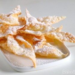 Faworki (Polish Chrusciki) - Allrecipes.com Polish Kruschiki Recipe, Polish Fried Dough, Kruschiki Recipe, Polish Paczki Recipes, Polish Angel Wings-chrusciki, Deep Fried Puff Pastry, Deep Fried Perogies, Crostoli Recipe Italian, Polish Desserts Traditional