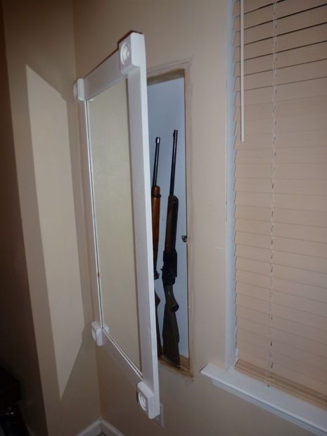 Hidden in wall Gun Cabinet -- all you see is the MIRROR!  Easy step-by-step instructions Hidden Rooms, Hidden Wall, Concealment Furniture, Bench Vise, Hidden Spaces, Cabinet Plans, Wall Safe, Hidden Compartments, Secret Storage