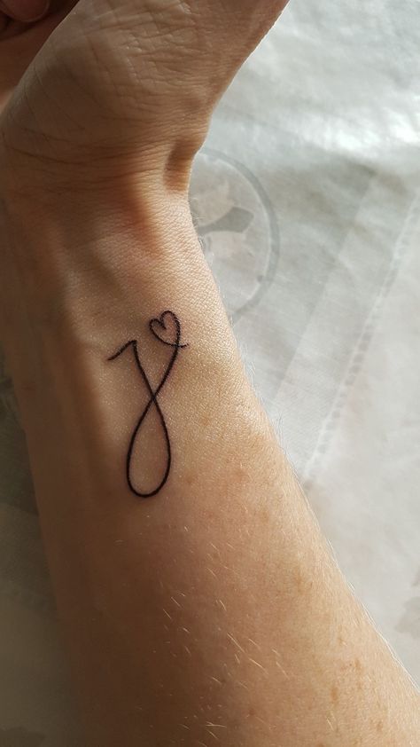 I'm in love with this letter J for Jesus tattoo. What a beautiful, meaningful way to honor our God. Such unique and meaningful tattoo design ideas for women including small cross, verses, symbols on foot, wrist, forearm and more. #wristtattoos #cutetattoos #tattoosforwomen #smalltattoos #tattooideas #minimalisttattoo #christiantattoo #christiantattoosforwomen Tattoo Placements, Initial Tattoo Fonts, 143 Tattoo Ideas, Christian Tattoo Ideas, Tato Jari, Tattoos For Women Small Meaningful, J Tattoo, Christian Tattoo, Cursive Tattoos
