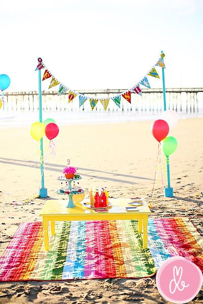 As gorgeous as this looks, you might fare better with a fold-up table or large TV tray. From DrewbPhotography. Rainbow Photoshoot, Kids Beach Party, Beach Birthday Party, Summer Party Decorations, Beach Birthday, Festa Party, Picnic Party, Beach Kids, Beach Picnic