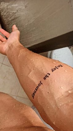 Leg Tattoo Men Quote, Men Writing Tattoo, Script Tattoos Men, Stoic Quote Tattoo, Quotes For Tattoos For Guys, Men’s Quote Tattoo, Its Okay Tattoo Ideas, Forearm Word Tattoos Men, Collarbone Tattoos Men