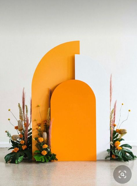 Orange And White Decor, Eclectic Wedding Arch, Modern Backdrop Ideas, Mid Century Modern Wedding Decor, Modern Wedding Backdrop, Marigold Wedding Decoration, Couples Embracing, Orange Wedding Decor, Orange Decorations