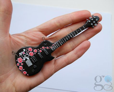 Made out of FIMO. More pictures in my Breslo: [link] Clay guitar tutorial: [link] Cute guitar Fimo, Guitar, Clay Guitar, Link Cute, Cute Guitar, Guitar Tutorial, More Pictures, Making Out, Deviantart