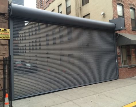 Want to motorize your rollup shutters/doors or increase speed of your automatic overhead rollup door? Call the experts at Loading Dock Inc/Overhead Door Company of Meadowlands/NYC to schedule an estimate. Shutter Gate Design, Garage Roller Door Ideas, Roller Doors Garage, Roll Up Doors In House, Roller Shutters Exterior, Roll Door, Roller Shutter Door, Roll Up Door, Rooftop Patio Design