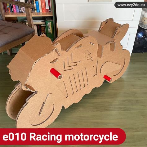 True size cardboard racing motorcycle for your children Cardboard Motorcycle, Cardboard City, Motorcycle Party, Cardboard Costume, Cardboard Car, Cardboard Toys, Lego People, Cardboard Sculpture, Simple Toys