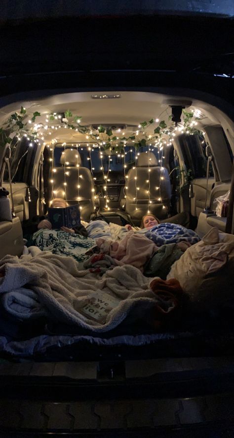 Car Pillows Aesthetic, Minivan Interior Ideas, Fairy Lights Car Interior, Inside Of Cars Decorations, Car With Bed In Back, Trunk Sunset Date, Car Hangout Aesthetic, Car Movie Night Date, Comfy Backseat Car