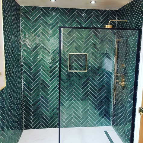 Green bathroom tile, herringbone, brass shower fixtures, wetroom base, porcelain floor. Green Herringbone Bathroom Tiles, Green Tile Wet Room, Forest Green Bathroom Tile, Green Wood Bathroom Ideas, Green Tile Bathroom Gold Fixtures, Green Tiles For Bathroom, Bathroom With Green Tile Walls, Green Herringbone Shower Tile, Green Tiled Shower Room