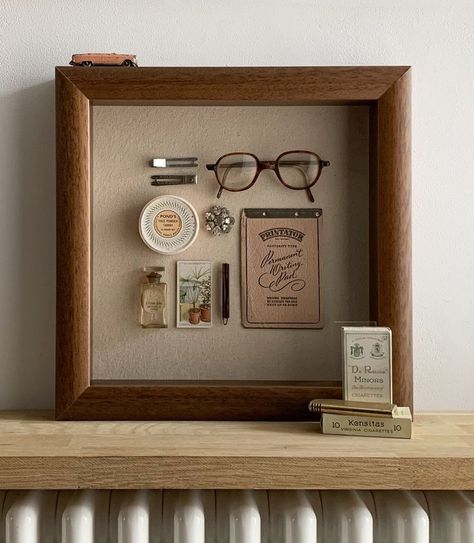 Memento Display Ideas, Memrobilia Display Ideas, Pin Shadow Box Display, Gallery Wall With Shadow Boxes, Shadow Frames Ideas, Displaying Small Collectables, Sentimental Gallery Wall, Bathroom Shadow Box Ideas, Memory Box Frame Ideas