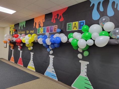 Science Week Decoration Ideas, Science Fair Preschool, God’s Word For Life Science Lab, Elementary Science Teacher Aesthetic, Science Lab For Kindergarten, Science Fair Bulletin Board Ideas, Science Balloon Garland, Elementary Science Bulletin Board Ideas, I Wonder Vbs Decorations