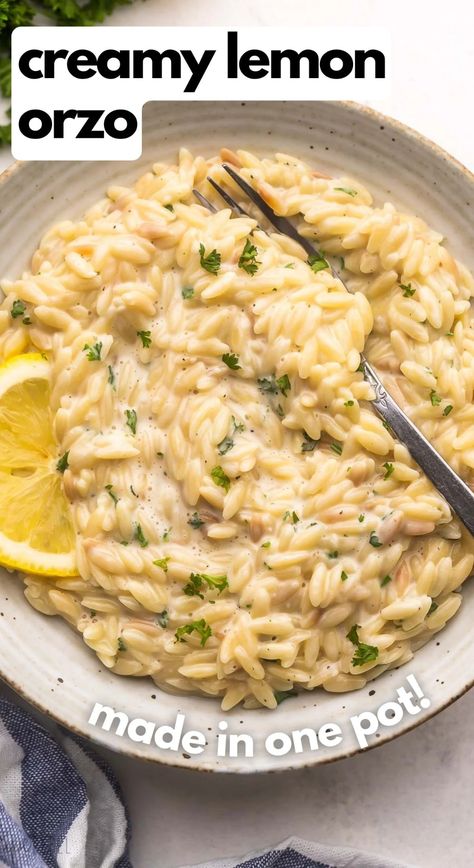 Lemon Orzo pasta is a bright, beautiful pasta dish that's ideal for celebrating the spring and summer seasons! Perfectly cooked tender orzo is all dressed up with fresh lemon juice, garlic, parmesan, and just the right amount of heavy cream to really send it over the top. #orzo #pasta #dinner #recipe | orzo recipes | dinner recipes | dinner ideas | easy dinner recipes | pasta recipe | one pan pasta | vegetarian Lemon Orzo Pasta With Chicken, One Pot Side Dishes, Lemon Cream Orzo Pasta, Lemon Parm Orzo, Creamy Lemon Orzo Chicken, Pasta Rice Recipes, Lemon Ricotta Orzo, Garlic Parm Orzo, Orzo Recipes Lemon