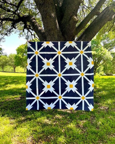 Rachel | Sew Joyful Studio on Instagram: "Navy and Gold - there's a reason this color combo is a classic.✨💙  This phenomenal #allwrappedupquilt was made by @craftymoose_quilts and it is a jaw dropper! Ann went back and forth on color scheme, but ultimately went with her initial choice, and WOW.   Ann is one of those people who will show up to every game and be your loudest cheerleader - consistently lifting up those around her. It is a true JOY to call her my friend💕 I have had the pleasure of making a few quilts from Ann's patterns, and they are all beautiful and have incredible meaning behind them!  Go give her a follow @craftymoose_quilts to keep an eye on what's coming next - ever wanted an expert to teach you how to make tshirt quilts? Because she is your girl! Don't miss it!  If yo Patchwork, Tshirt Quilts, Tshirt Quilt, Half Square Triangles, Thread Spools, Your Girl, Printer Paper, Quilting Crafts, Color Combo