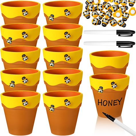 PRICES MAY VARY. Unleash Your Creativity with DIY Set: the package includes 12 terracotta honey bee pots, 24 bee decorations, and 2 markers in black, ideal for DIY some gift, bringing out your artistic side to create unique vibrant displays, adding fun to your bee party, birthday parties, baby showers Ideal Decorations for Special Events: the terracotta pots can be applied to a bee themed party or other special event; They are designed with irregular yellow edges, it looks like honey overflows; Bee Theme Party Decorations, Honey Bee Birthday Theme, Honey Bee Centerpieces, Sweet As Can Bee Baby Shower Theme, Yellow Decorations Party, Bee Theme Gender Reveal Party, Bee Baby Shower Theme Decoration, Bee Themed Food, Bee Hive Decor