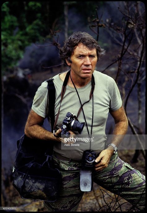 English war photographer Don McCullin with his favourite Olympus camera in the Philippines, 7th November 1986. Don Mccullin, World Photography Day, Olympus Camera, Photographer Camera, Photography Day, Photographs Of People, Famous Photographers, Marca Personal, World Photography
