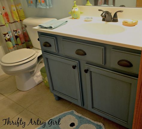 Thrifty Artsy Girl: Builders Grade Teal Bathroom Vanity and Faucet Upgrade for only $60 Teal Bathroom Vanity, Bathroom Ideas Teal, Bathroom Wall Decor Diy, Bathroom Cabinet Makeover, Rustoleum Chalk Paint, Glazing Furniture, Waverly Chalk Paint, Diy Medicine, Bathroom Shelves Over Toilet