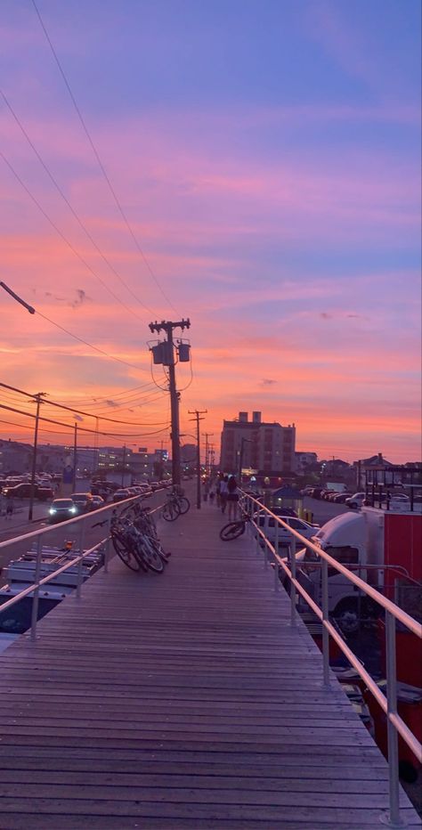 Aesthetic sunset boardwalk image Summer Boardwalk Aesthetic, Outskirts Of Town Aesthetic, Wildwood Aesthetic, Beach Boardwalk Aesthetic, Miranda Aesthetic, Suburbs Aesthetic, Nj Aesthetic, Boardwalk Aesthetic, Boardwalk Sunset