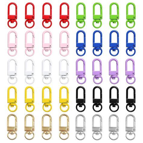 PRICES MAY VARY. [Package Includes]You will receive 40pcs lobster claw clasps,10 colors,white K, red, K gold, green, black, purple, royal blue, yellow, white, pink,4pcs of each color.Sufficient quantity to meet your various needs of DIY making. [Material and Size]The swivel lanyards trigger snap is made of high-quality alloy, not easy to rust, not easy to fade, smooth surface without pits, bright colors, and durable.Size:13 x 34mm/0.51 x 1.34inch. [10 Colors Available]These crab claw clasps are Craft Accessories, Lanyard Diy, Clasps For Jewelry, Diy Collares, Colorful Keychain, Diy Lanyard, Keychain Lanyard, Jewelry Clasps, Diy Rings