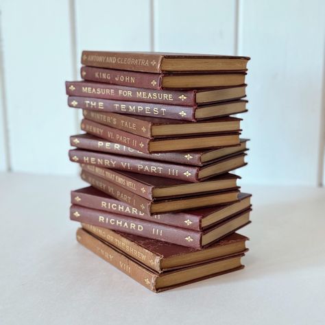 This absolutely gorgeous collection is a partial set of the Aldus Shakespeare's Works in from 1909. PublishedFunk and Wagnalls. The spines have aged naturally to display a lovely mix of copper and red.  A must-have for any Shakespeare collector or for adding a unique element to your home or event.  In this set are the following volumes: - Henry VI, Part One - Henry VI, Part Two - Henry VI, Part Three - Winter's Tale - All's Well That Ends Well - King Richard, Part Two - King Richard, Part Three - Taming of the Shrew - King Henry VIII This set is 7 inches tall and 5.75 inches across.  **Condition** These are all vintage books and show various signs of aging, which may include damaged spines, smudges, fading, bumped corners, etc. All these natural signs of age are what make vintage books suc Henry Viii, Shakespeare Words, Taming Of The Shrew, King Henry Viii, King Richard, King Henry, Winter's Tale, Wedding Props, Brown Kraft Paper