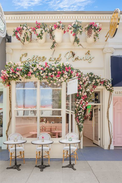 Cute Bakery Exterior Design, Vintage Flower Shop Interior, Flower Shop With Bakery, Bakery Photo Op Wall, Cafe Outside Design Store Fronts, Coffee Shop White Design, Bakery With Flowers, Restaurant Flower Decoration, Flower Shops Aesthetics